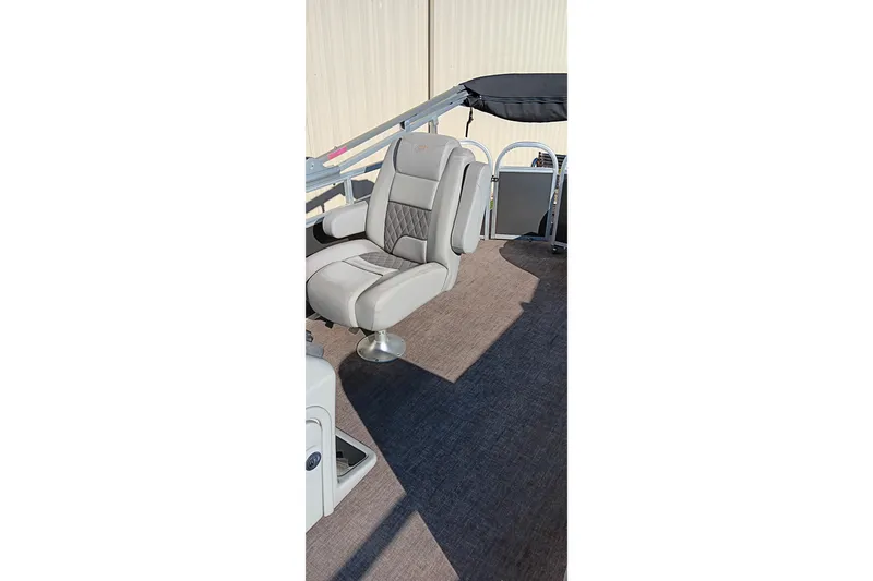 Slide: The Image of 2023 Ranger Reata 223C boat interior with comfortable seating and modern design. - 34