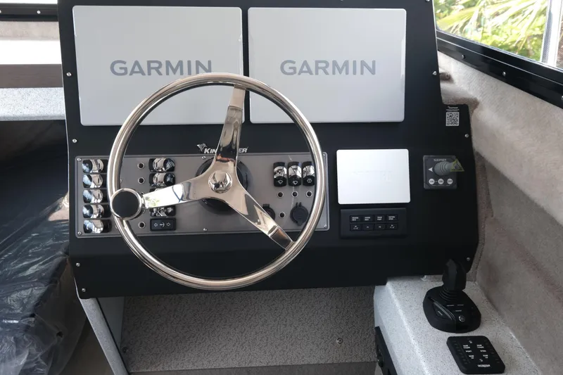 Slide: The Image of Control panel of 2026 KingFisher 3025 XRS boat with Garmin displays. - 16