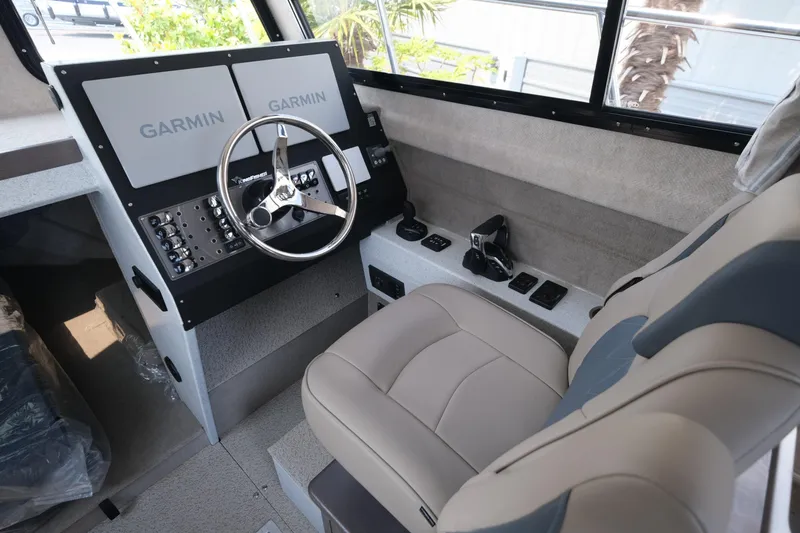 Slide: The Image of Interior of 2026 KingFisher 3025 XRS boat with Garmin navigation system. - 17