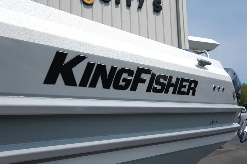 Slide: The Image of 2026 KingFisher 3025 XRS boat side view with bold logo. - 26
