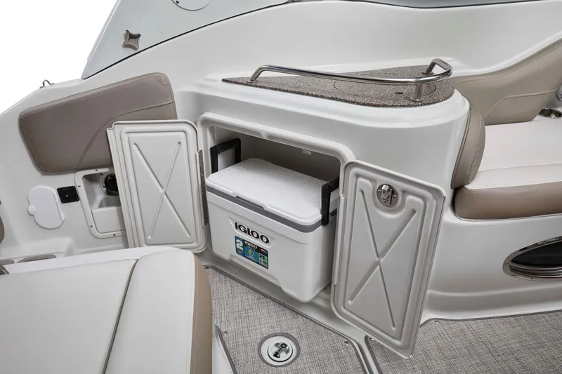 Slide: The Image of 2026 Crownline 270 CR boat interior with Igloo cooler storage compartment. - 9