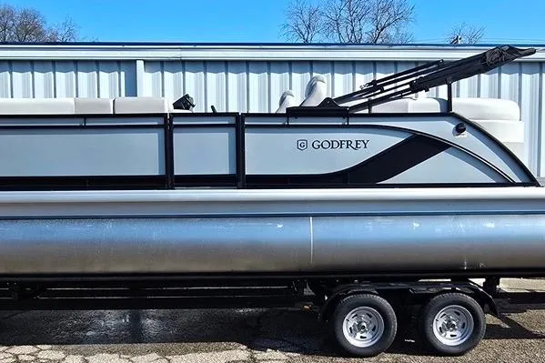 Slide: The Image of 2026 Godfrey Sweetwater 2286 SBC pontoon boat on trailer, side view. - 14