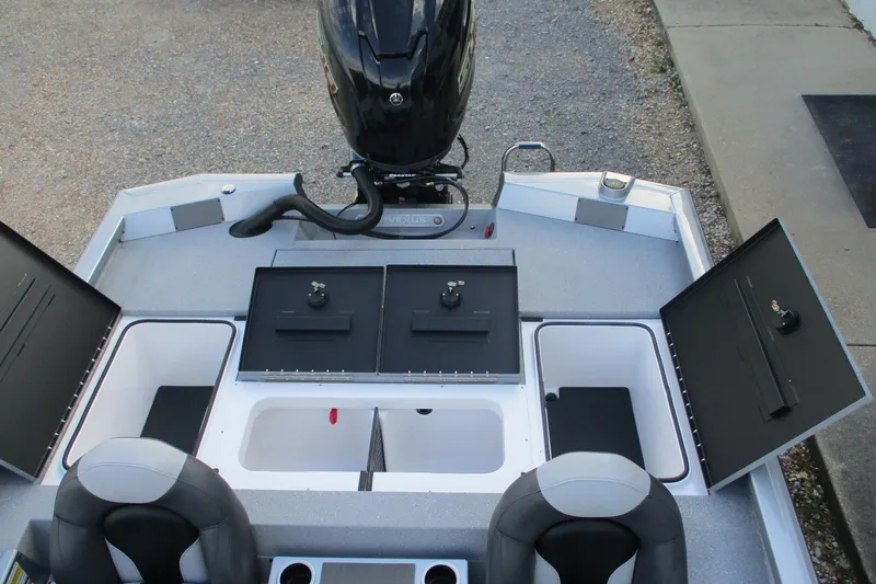 Slide: The Image of 2026 Vexus AVX2080 boat interior with storage compartments and seating. - 11