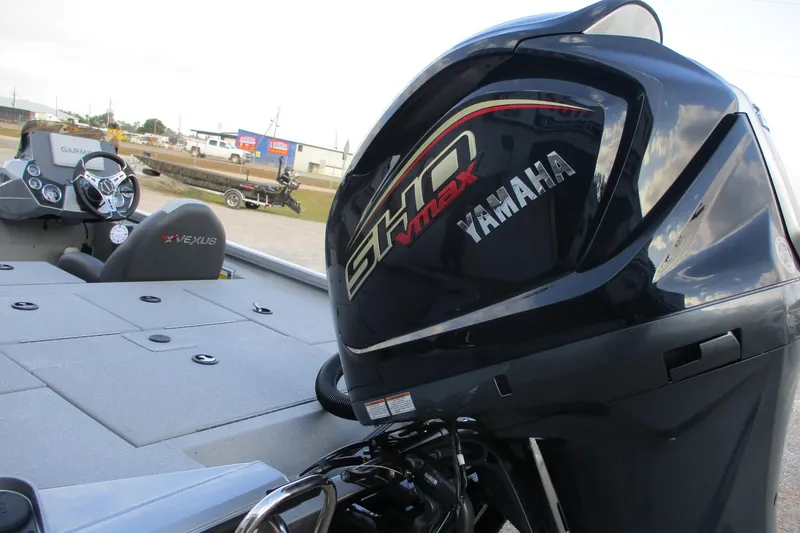 Slide: The Image of 2026 Vexus AVX2080 boat with Yamaha VMAX engine, featuring modern dashboard and seating. - 3