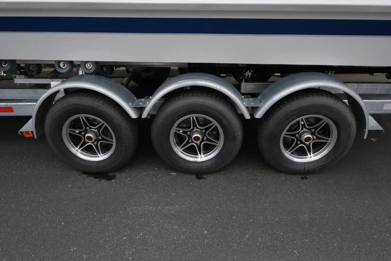 Slide: The Image of Triple-axle trailer of 2026 KingFisher 3025 XRS boat on asphalt. - 27