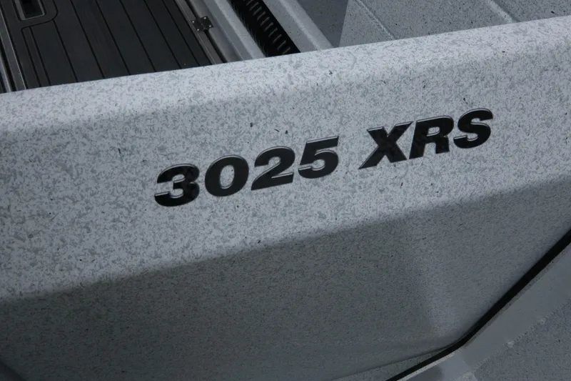 Slide: The Image of Close-up of 2026 KingFisher 3025 XRS boat model name on hull. - 29