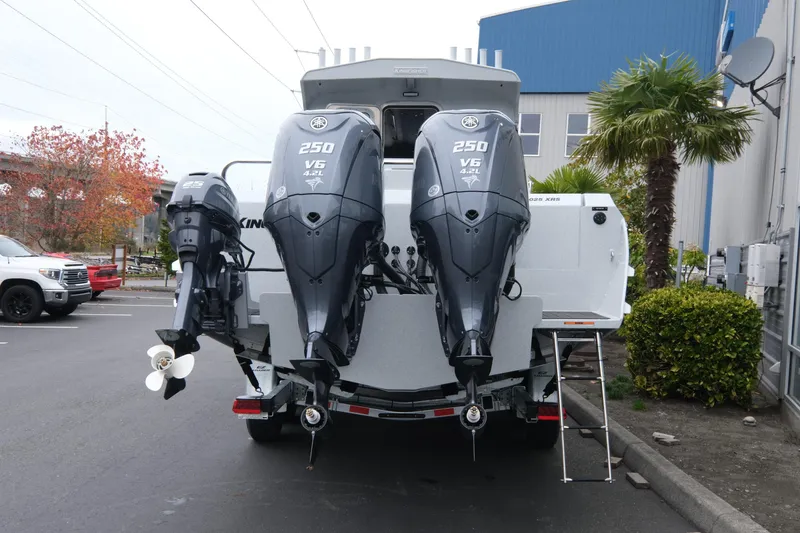Slide: The Image of 2026 KingFisher 3025 XRS boat with triple Yamaha 250 V6 outboard engines. - 5