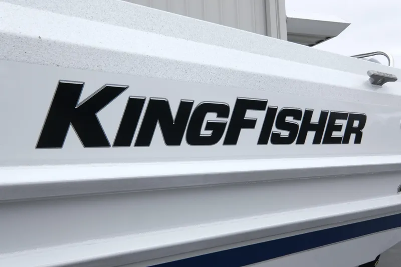Slide: The Image of Close-up of 2026 KingFisher 3025 XRS boat logo on white hull. - 6