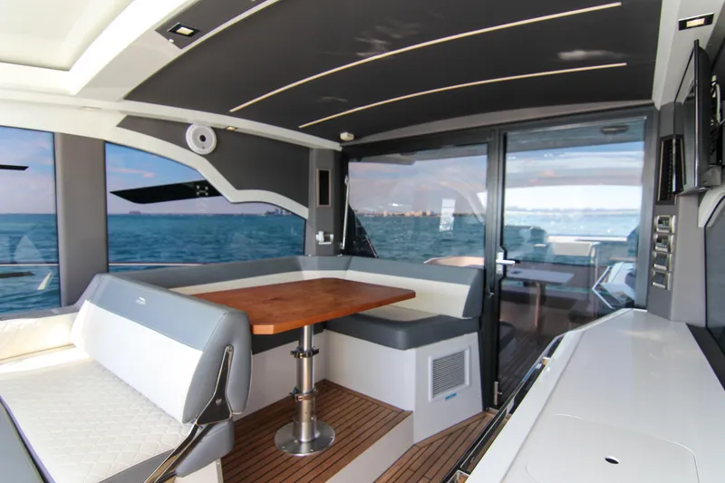 Slide: The Image of Luxurious interior of 2021 Galeon 425 HTS yacht with ocean view and modern seating. - 15