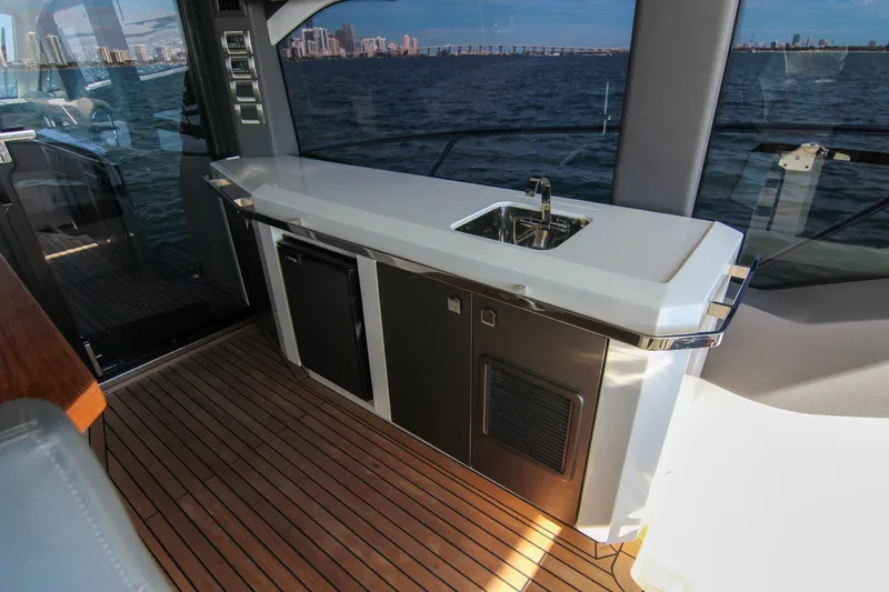 Slide: The Image of Modern kitchenette on 2021 Galeon 425 HTS yacht with ocean view. - 16