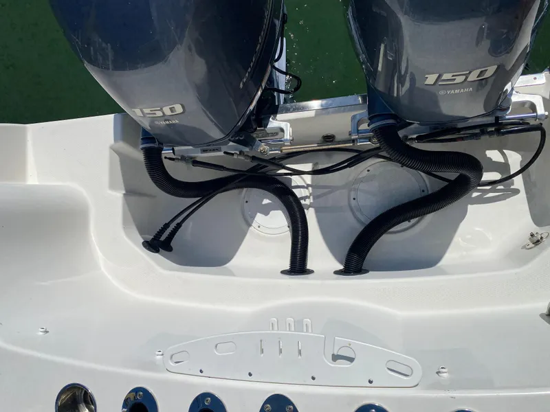 Slide: The Image of 2018 Sailfish 275 DC boat with Yamaha 150 engines. - 10