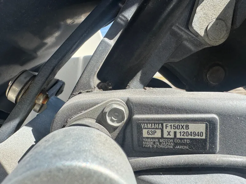 Slide: The Image of Close-up of Yamaha F150XB engine plate on a Sailfish 275 DC boat. - 11