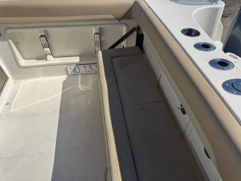 Slide: The Image of Interior of a 2018 Sailfish 275 DC boat with seating area. - 17