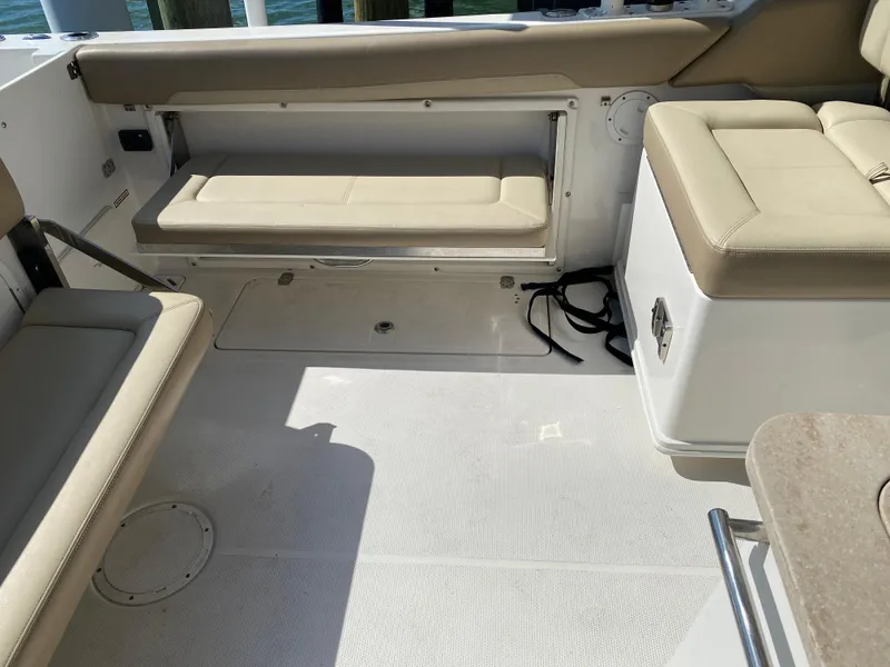 Slide: The Image of Interior of a 2018 Sailfish 275 DC boat with seating area. - 21