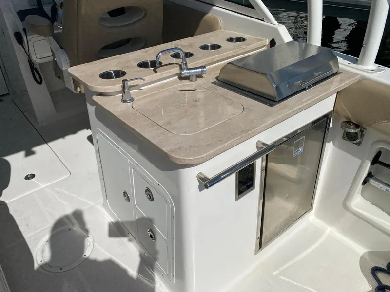 Slide: The Image of Galley area on a 2018 Sailfish 275 DC boat. - 25