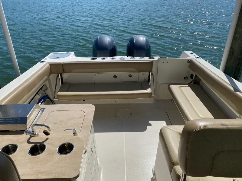 Slide: The Image of Interior view of a 2018 Sailfish 275 DC boat on the water. - 26