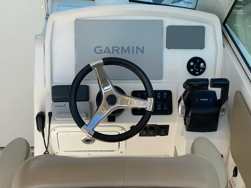 Slide: The Image of 2018 Sailfish 275 DC helm with Garmin navigation system. - 30