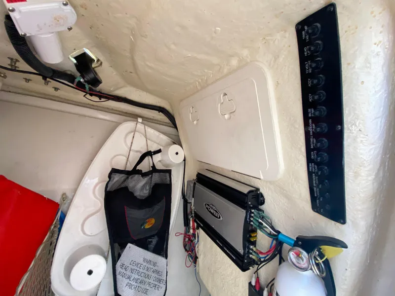 Slide: The Image of Interior of a 2018 Sailfish 275 DC boat with electronics and accessories. - 34
