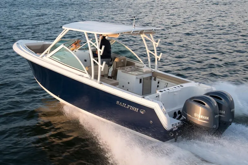 Slide: The Image of 2018 Sailfish 275 DC boat cruising on water. - 45