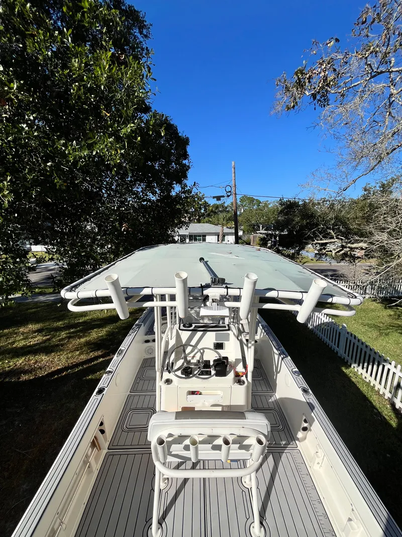 Slide: The Image of 2019 World Cat 230 CC boat with canopy, viewed from above. - 11