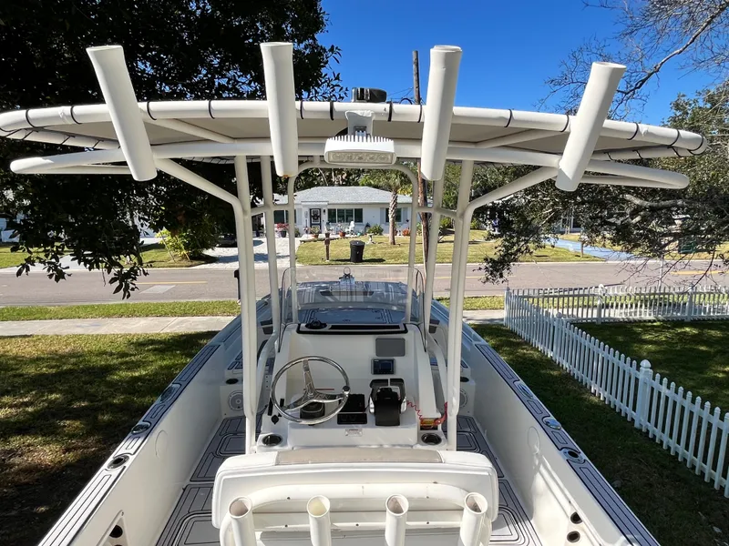 Slide: The Image of 2019 World Cat 230 CC boat with helm and rod holders. - 12