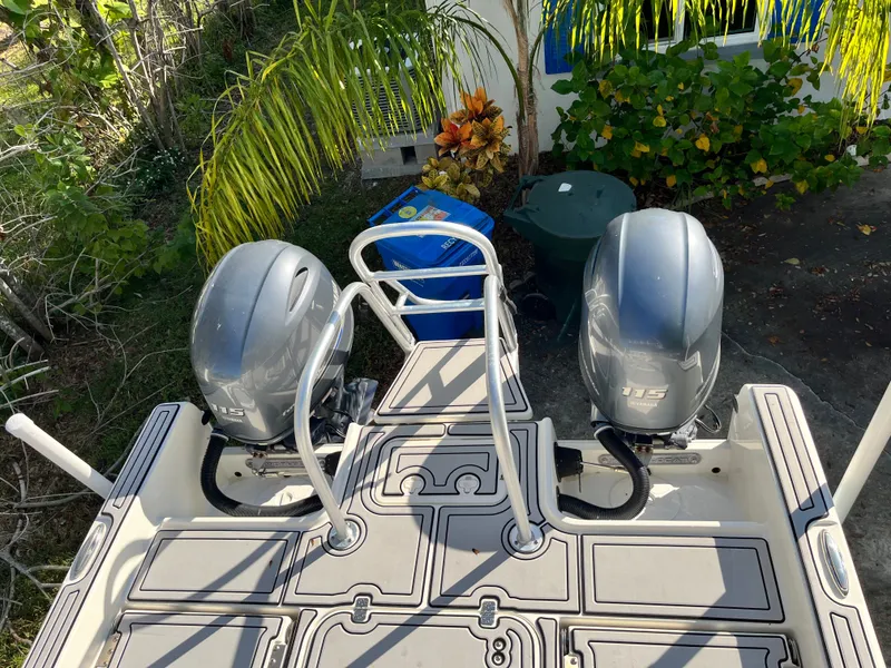 Slide: The Image of 2019 World Cat 230 CC with dual outboard engines. - 16