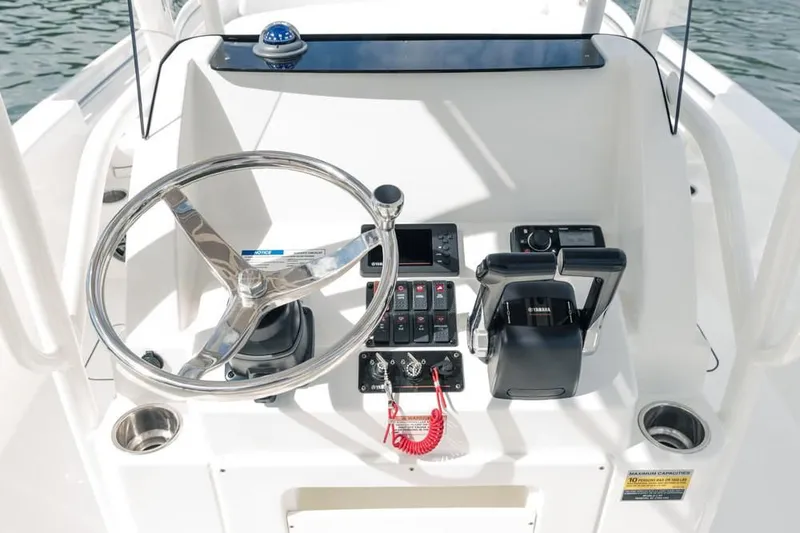 Slide: The Image of Steering console of the 2019 World Cat 230 CC boat. - 42