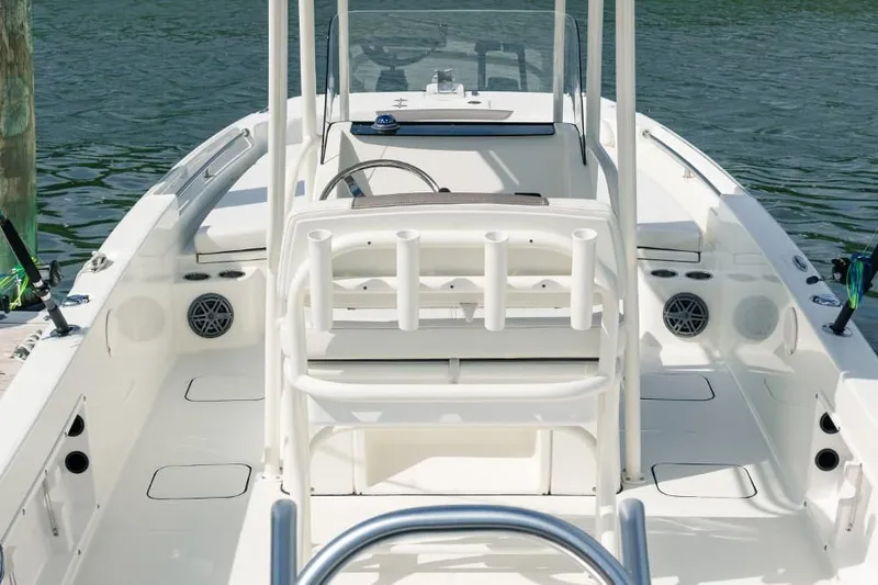 Slide: The Image of Interior view of a 2019 World Cat 230 CC boat on the water. - 45