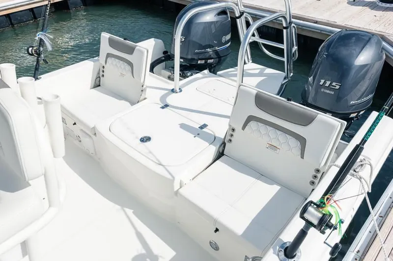 Slide: The Image of 2019 World Cat 230 CC boat with Yamaha engines at dock. - 47