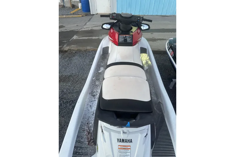 Slide: The Image of 2017 Yamaha WaveRunner FX HO jet ski on trailer, parked outdoors. - 10