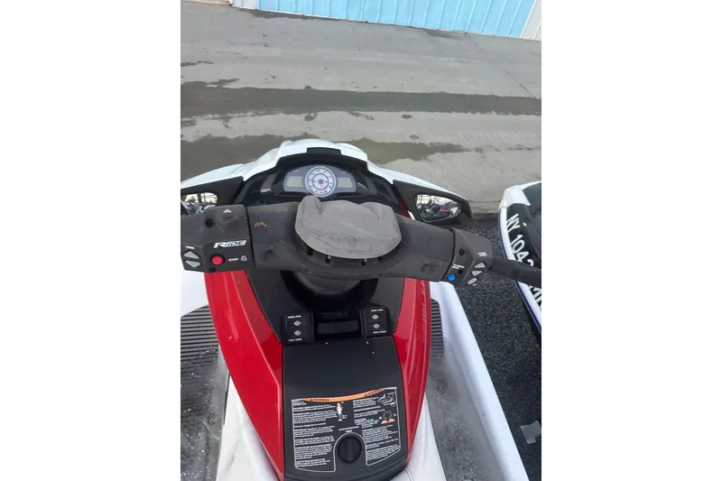 Slide: The Image of 2017 Yamaha WaveRunner FX HO dashboard and controls, red and white design. - 9