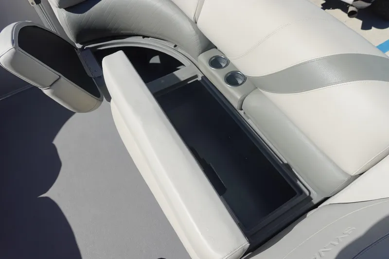 Slide: The Image of 2018 Sylvan Mirage 8522 boat seat with storage compartment and cup holders. - 19