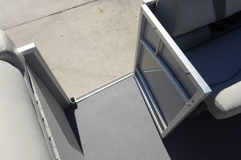 Slide: The Image of 2018 Sylvan Mirage 8522 pontoon boat interior with open gate and seating. - 25