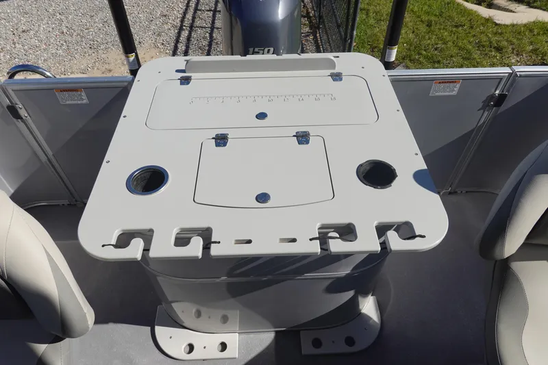 Slide: The Image of 2018 Sylvan Mirage 8522 boat table with cup holders and storage compartments. - 7