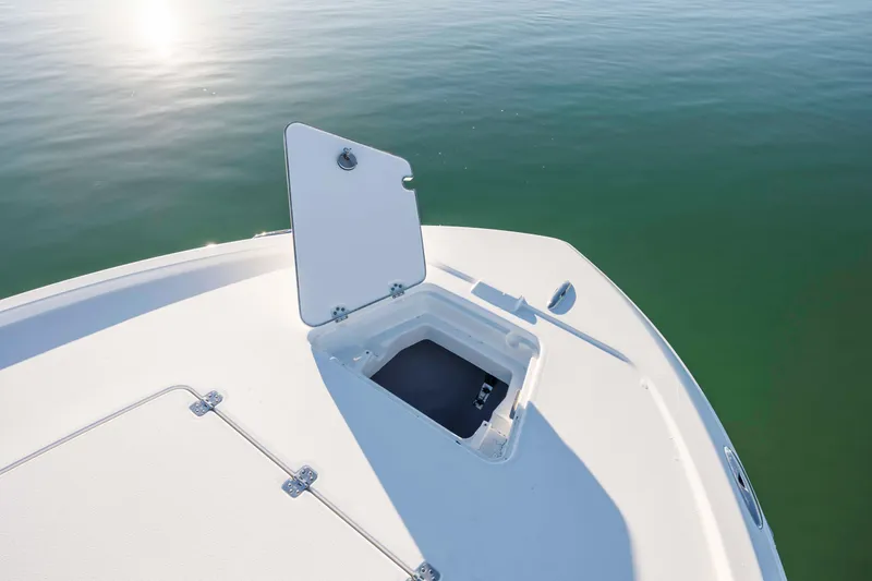 Slide: The Image of Open storage compartment on Caymas 281 HB boat, 2026 model. - 12