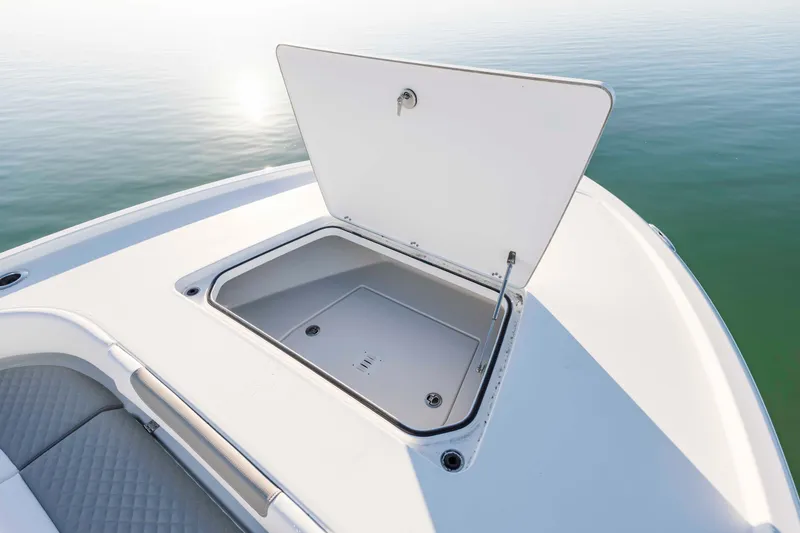 Slide: The Image of Open storage compartment on Caymas 281 HB boat, year 2026. - 13