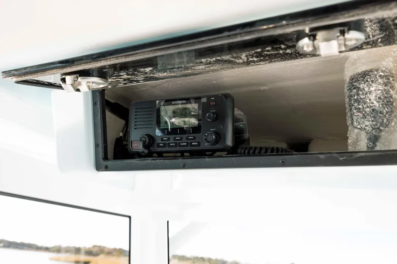 Slide: The Image of Garmin radio in Caymas 281 HB boat, year 2026. - 18