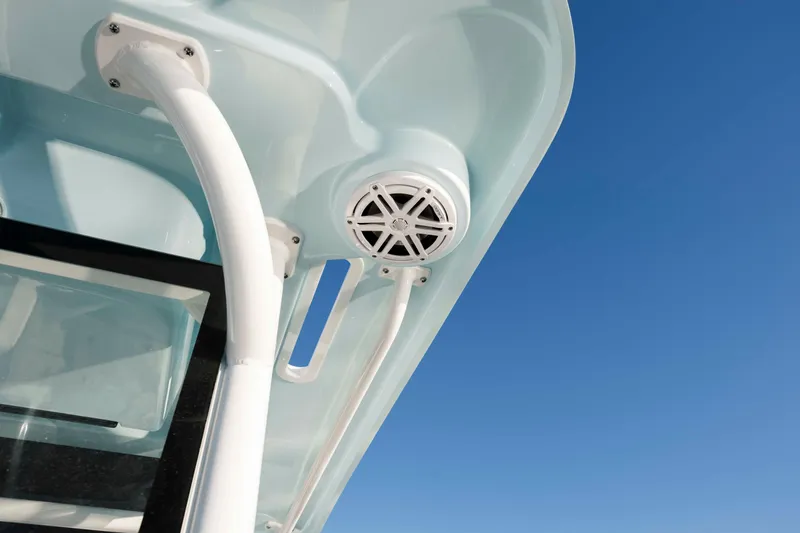 Slide: The Image of Caymas 281 HB 2026 boat roof with speaker, blue sky. - 19