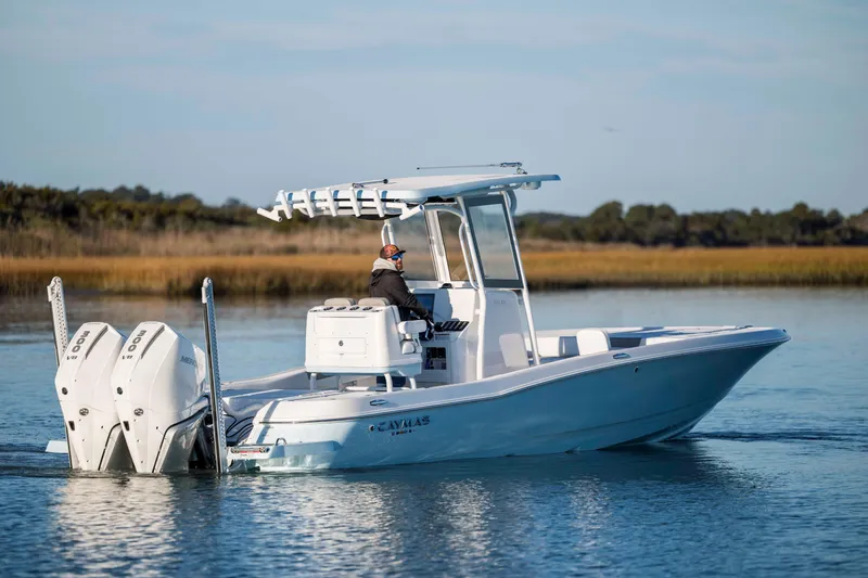 Slide: The Image of 2026 Caymas 281 HB boat on calm water. - 7