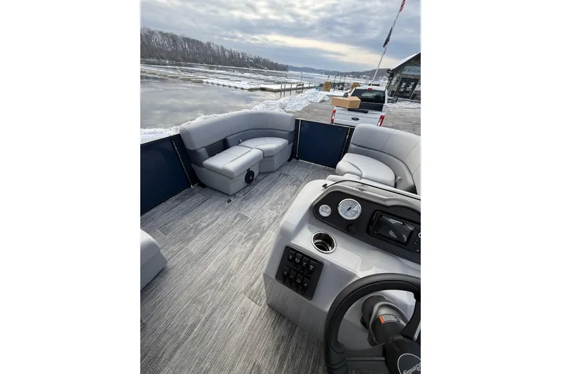 Slide: The Image of 2026 Bentley Pontoons 200 Fish-N-Cruise interior with gray seating and control panel. - 14