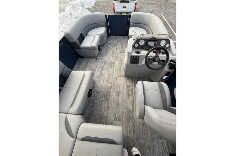 Slide: The Image of 2026 Bentley Pontoons 200 Fish-N-Cruise interior with plush seating and modern dashboard. - 6
