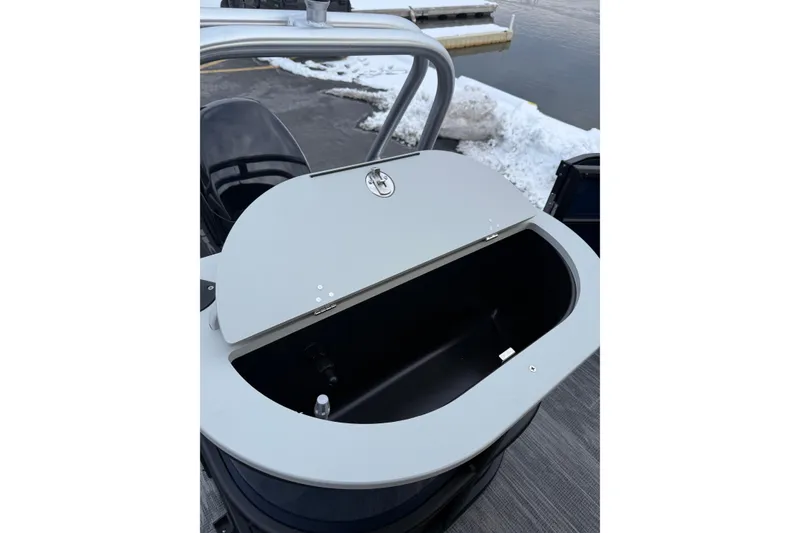 Slide: The Image of 2026 Bentley Pontoons 200 Fish-N-Cruise storage compartment near snowy dock. - 9