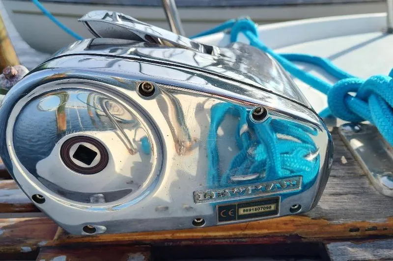 Slide: The Image of Chrome winch on 1987 Albin Family Cruiser with blue rope. - 8