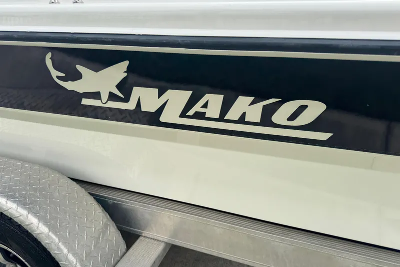 Slide: The Image of 2017 Mako Pro Skiff 19 CC boat logo on side panel. - 16