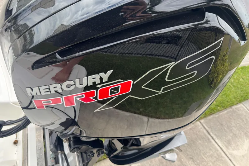 Slide: The Image of Mercury Pro XS engine on 2017 Mako Pro Skiff 19 CC boat. - 61