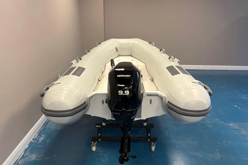 Slide: The Image of Inflatable boat with Mercury 9.9 motor, Caribe 8X model, 2025. - 5