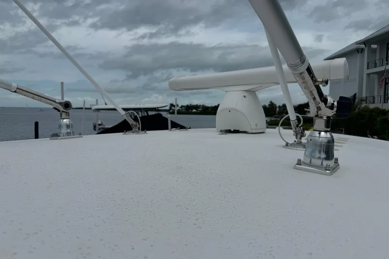 Slide: The Image of 2024 Contender 30 Tournament boat deck with radar and antennas, overcast sky. - 10