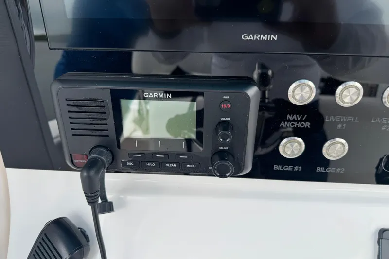 Slide: The Image of Garmin marine radio and control panel on 2024 Contender 30 Tournament boat. - 15