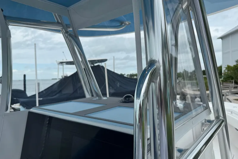 Slide: The Image of 2024 Contender 30 Tournament boat with sleek metal railings and modern design. - 17