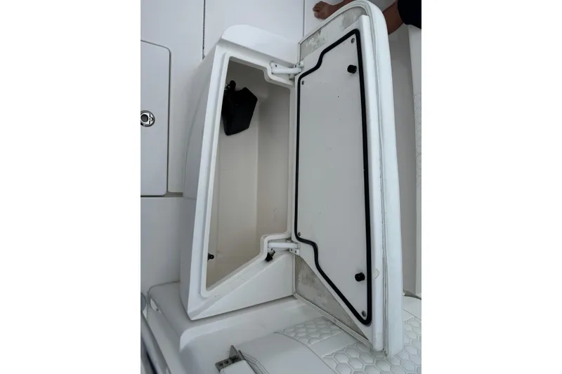 Slide: The Image of Open storage compartment on 2024 Contender 30 Tournament boat, showcasing interior space. - 31